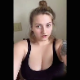 A blonde girl records herself shitting from an under the ass perspective. Nice, smooth, long turd. Vertical format video. About a minute.